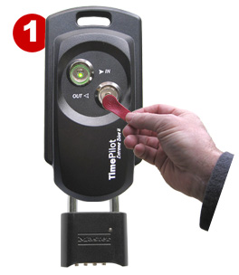 Employees clock in and out by tapping their iButton to the clock.